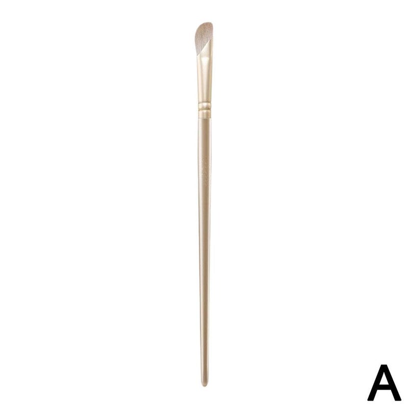 Champagne-colored half-fan-shaped sickle nose shadow brush, angled tip for blending highlighter, contour, and shading. Soft bristles.